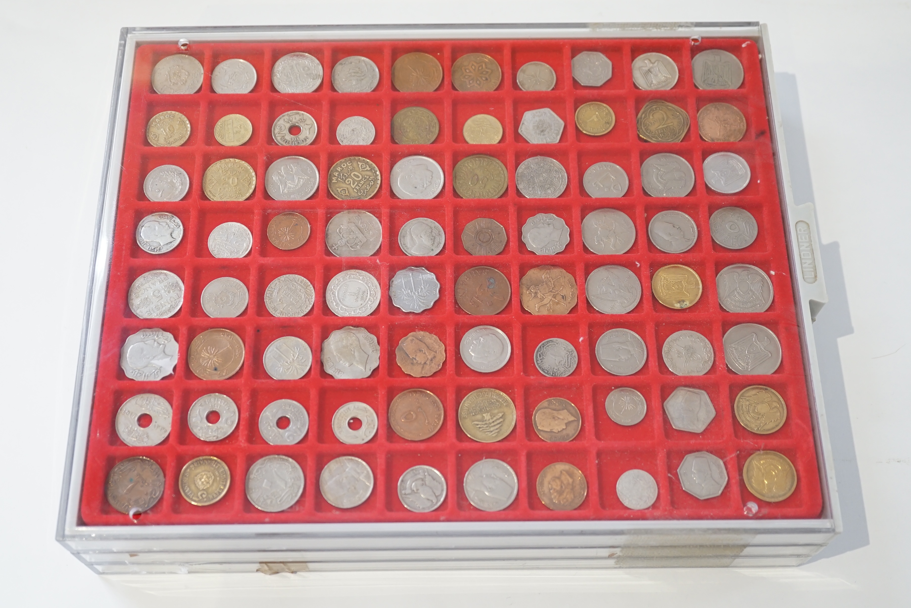 World coins, 20th century to include Tunisia, Palestine, Qatar, France, Italy, USA, housed in cases and a sleeve